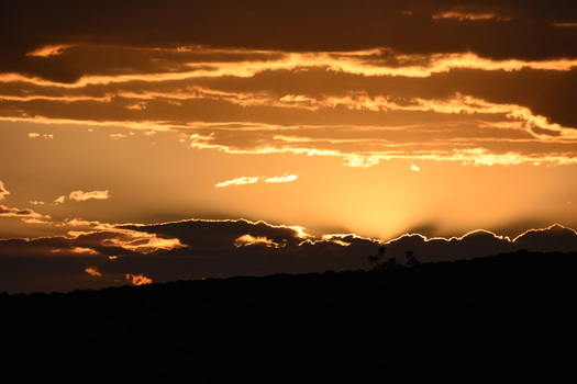 Illuminated Clouds at Sunrise or Sunset