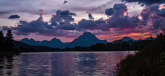 lake and mountains at sunset
