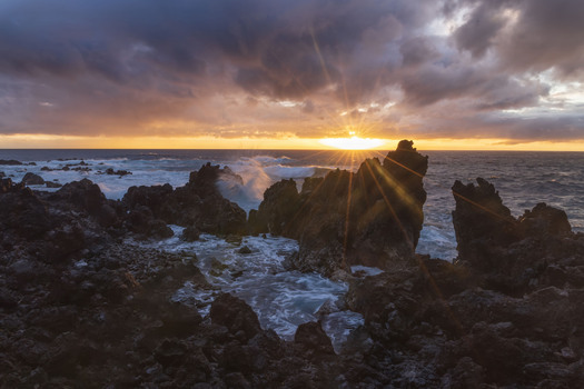 Rocky coast at sunrise or sunset