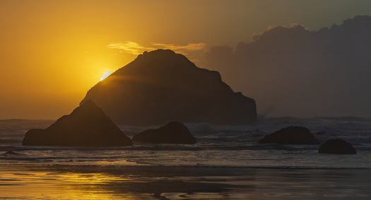 Silhouette of a rocky coast at sunset