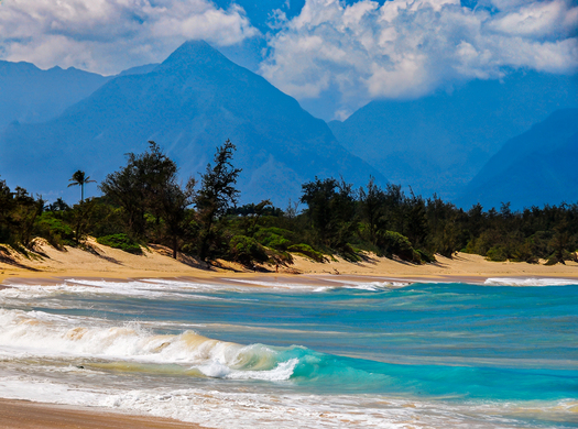 Coastline with mountains in the background
