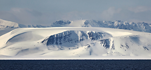 Rugged snow-covered coastline