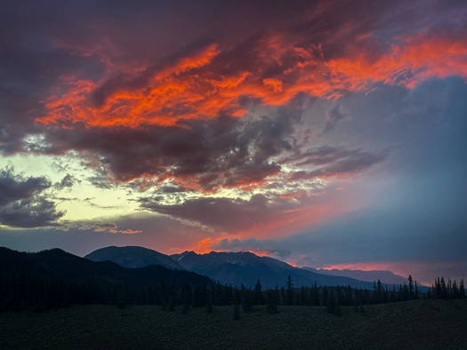 Colorful sky above mountains